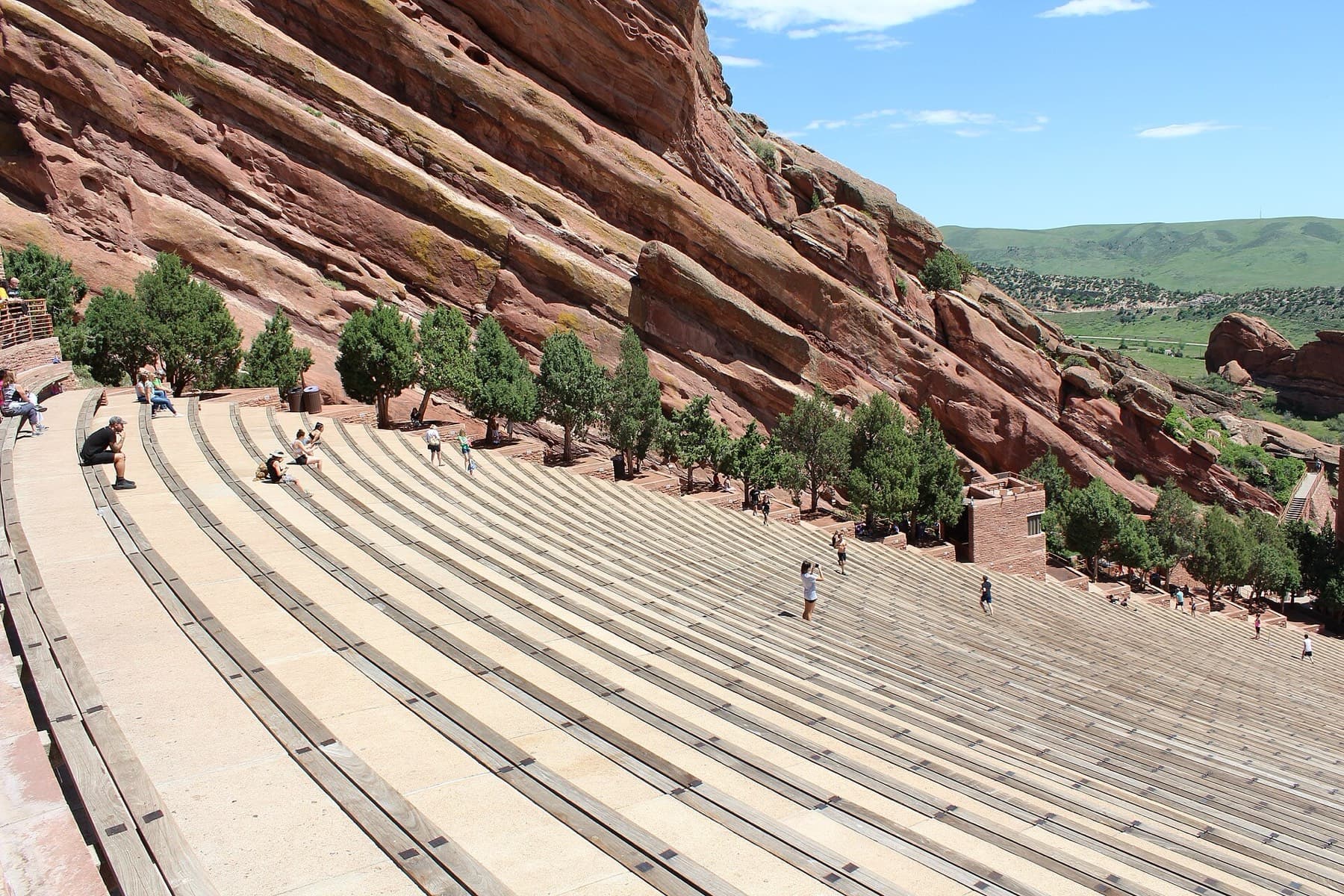 Tiered seating between red sandstone cliffs at Red Rocks Amphitheatre